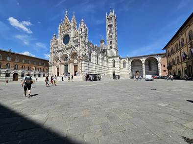 A picture containing outdoor, sky, cloud, medieval architecture

Description automatically generated